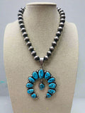 Kathleen Livingston Turquoise & Sterling Silver Naja Pendant
