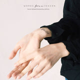 Steadfast Calligraphy Temp Tattoo | Skin and Hat Tattoo