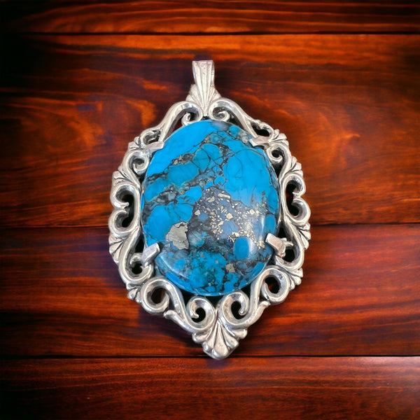 Turquoise pendant - gorgeous turquoise cabochon on cast sterling base