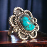 Turquoise ring - gorgeous cabochon on flower shaped sterling base - size 5
