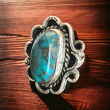 Turquoise ring - gorgeous large cabochon on sterling flower shaped base - size 7